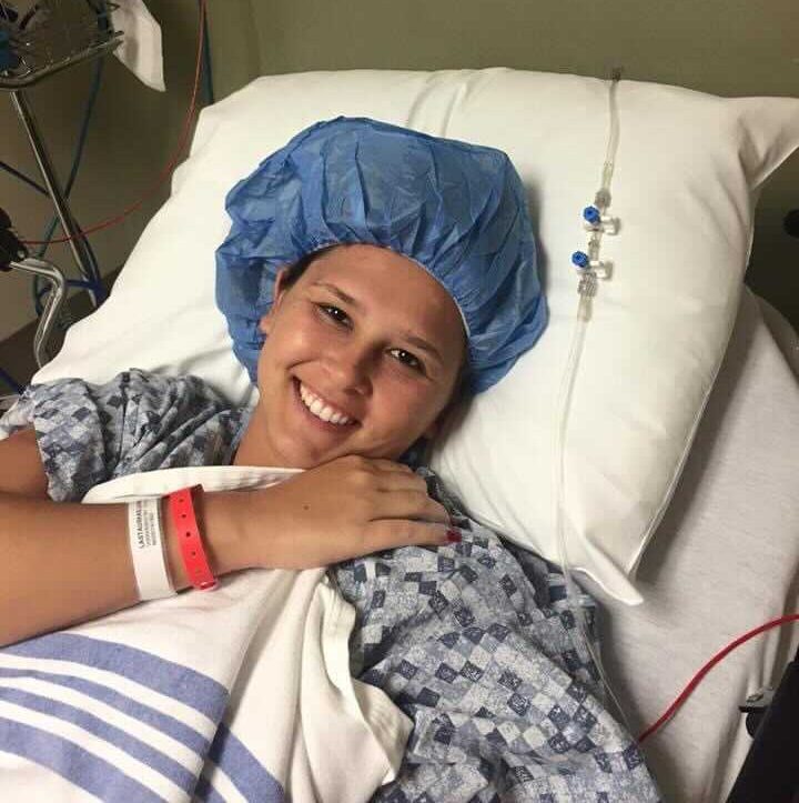 Lauren Lastauskas during cervical cancer treatment at age 23 as an adolescent and young adult cervical cancer patient